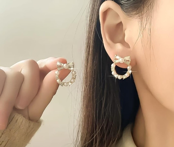 Pearl Bow Korean Zircon Earrings for Women – Elegant Bowknot Design with Sparkling Zircon and Pearl Accents | Premium Golden and Silver Fashion Jewelry for Weddings, Parties, and Everyday Wear | AXT-100 - Golden